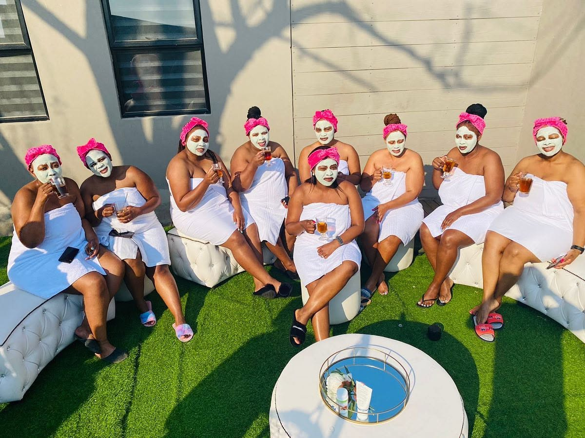 Group spa day on the lawn with robes, face masks and refreshments at 51 On Kologha
